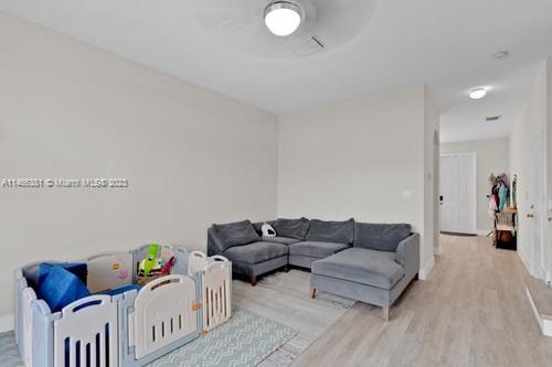 13234 Southwest 128th Path Miami, FL 33186 - Photo 17 of 38 a living room with furniture