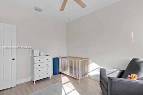 13234 Southwest 128th Path Miami, FL 33186 - Photo 26 of 38 a bedroom with furniture and a ceiling fan