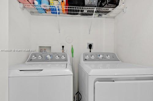 13234 Southwest 128th Path Miami, FL 33186 - Photo 28 of 38 a utility room with dryer and washer