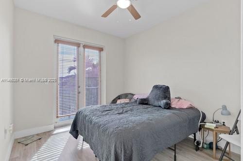 13234 Southwest 128th Path Miami, FL 33186 - Photo 30 of 38 a bedroom with a bed and a window