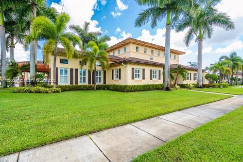 13234 Southwest 128th Path Miami, FL 33186 - Photo 32 of 38 a front view of house with yard and green space