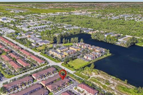 13234 Southwest 128th Path Miami, FL 33186 - Photo 38 of 38 an aerial view of residential houses with outdoor space