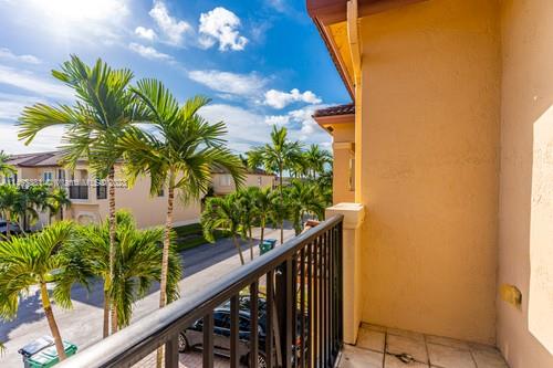 13234 Southwest 128th Path Miami, FL 33186 - Photo 4 of 38 a view of balcony with a palm tree