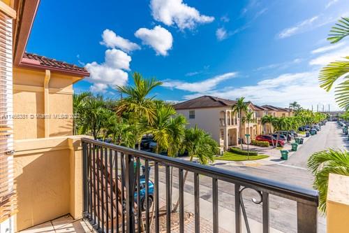 13234 Southwest 128th Path Miami, FL 33186 - Photo 5 of 38 a view of a balcony with potted plants