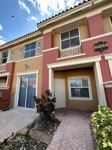 a house view with a outdoor space