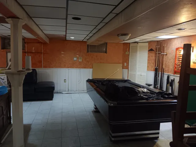 a bathroom with a sink a toilet and a shower