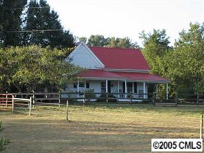 2203 Braswell-Rushing Road Monroe, NC 28110 - Photo 1 of 8 a view of a house with swimming pool