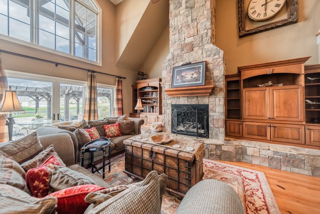 130 Chandelle Ridge Drive Woodruff, SC 29388 - Photo 12 of 45 a living room with furniture or outdoor view and a fireplace