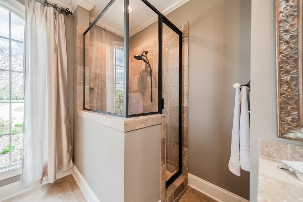 130 Chandelle Ridge Drive Woodruff, SC 29388 - Photo 25 of 45 a view of walk in closet with window and bathroom