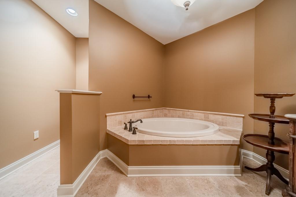 130 Chandelle Ridge Drive Woodruff, SC 29388 - Photo 33 of 45 a bathroom with a tub and sink