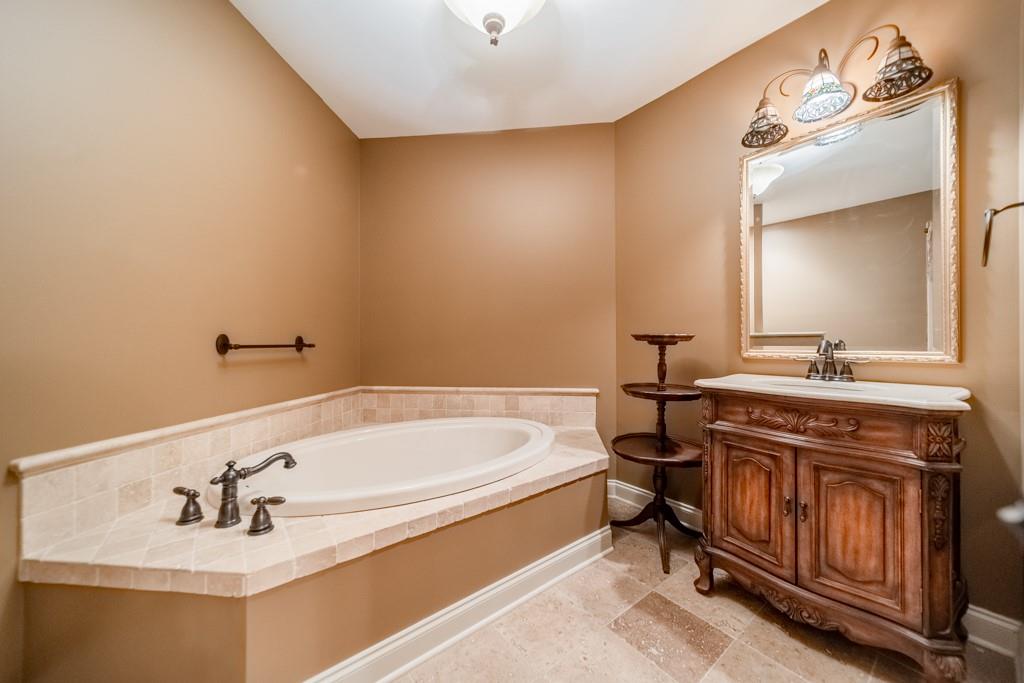130 Chandelle Ridge Drive Woodruff, SC 29388 - Photo 34 of 45 a bathroom with a sink and a mirror
