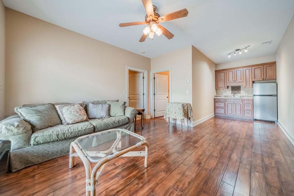 130 Chandelle Ridge Drive Woodruff, SC 29388 - Photo 41 of 45 a living room with furniture and a wooden floor