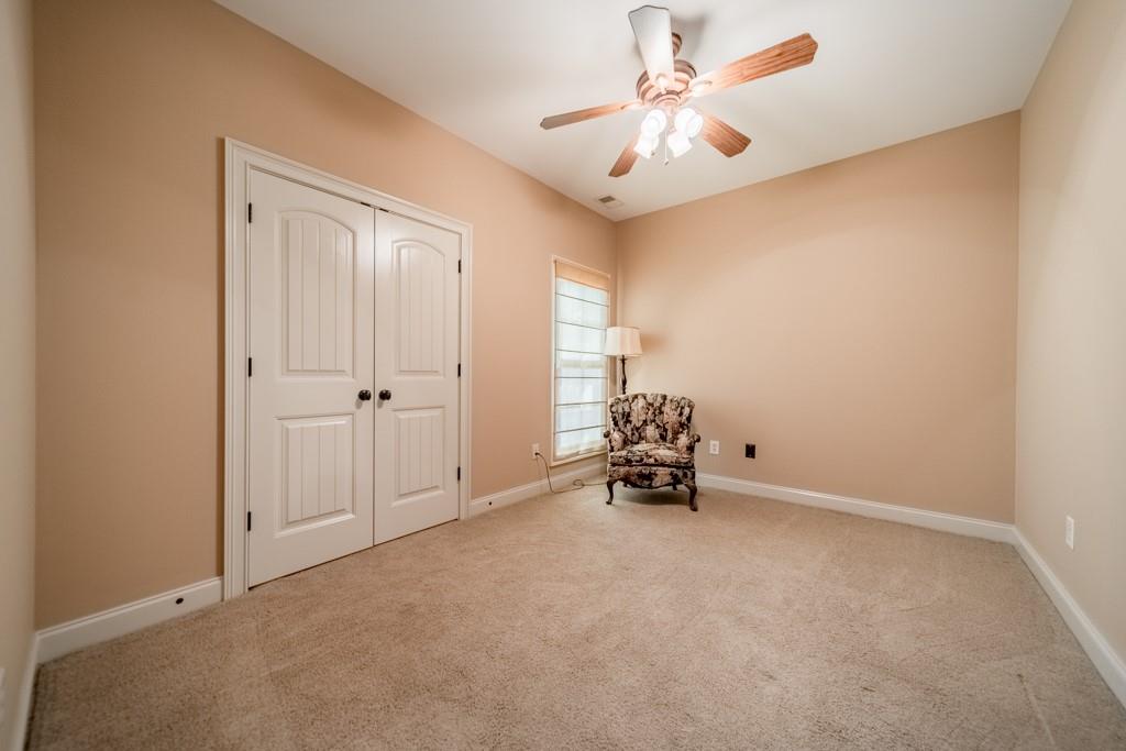 130 Chandelle Ridge Drive Woodruff, SC 29388 - Photo 43 of 45 an empty room with windows and fan