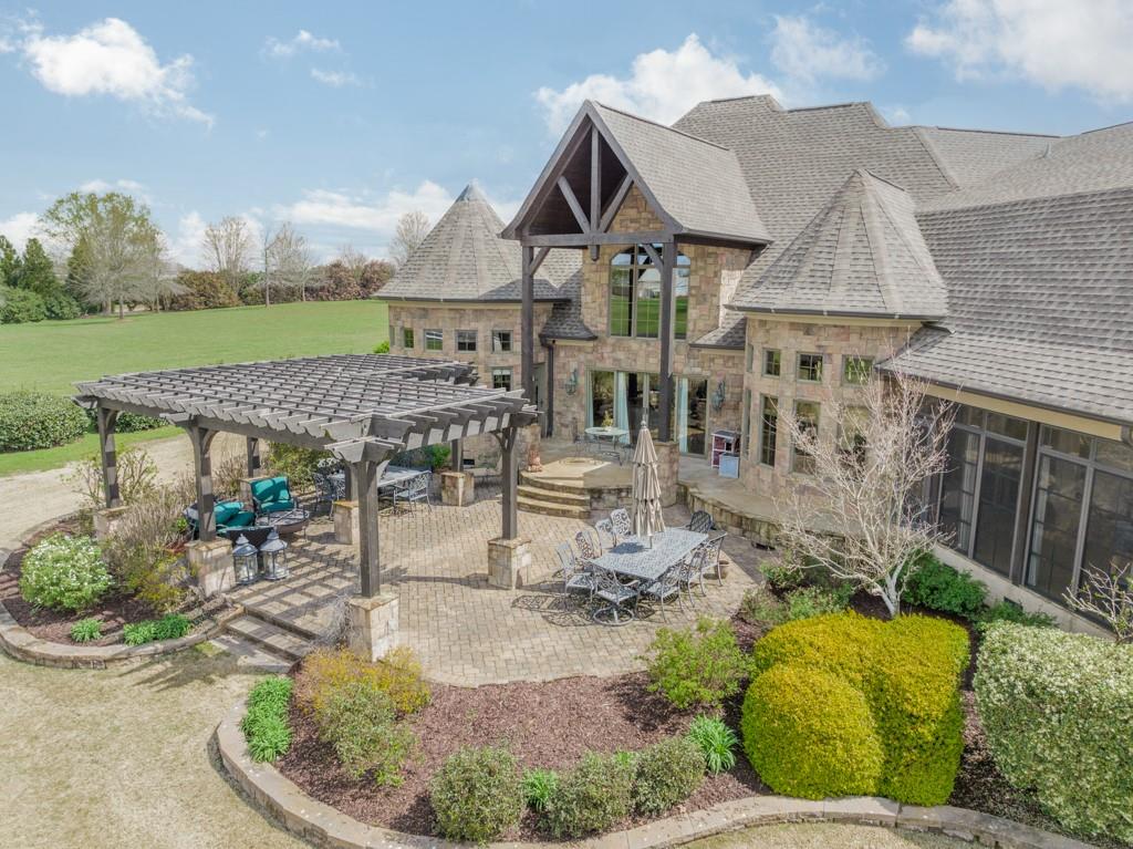 130 Chandelle Ridge Drive Woodruff, SC 29388 - Photo 8 of 45 an aerial view of a house with a yard and potted plants