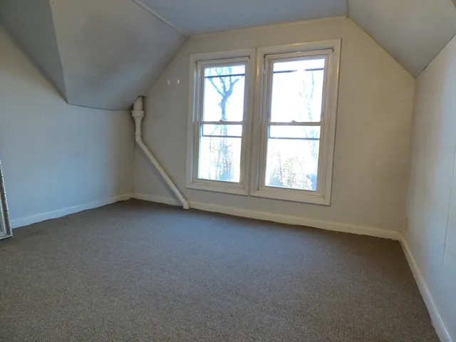 a view of a room with a door