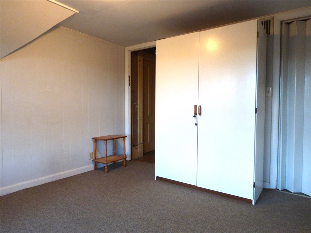 298 Main Street Springfield, MA 01151 - Photo 26 of 40 a view of a room with a door