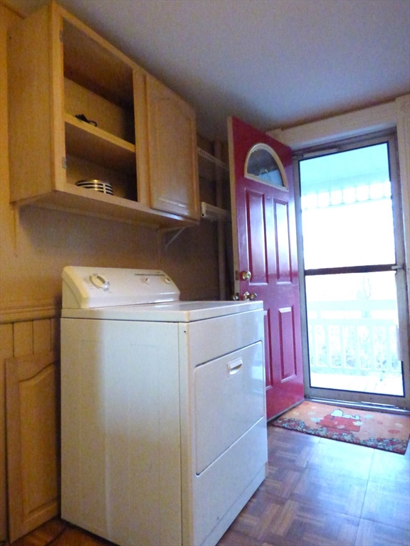298 Main Street Springfield, MA 01151 - Photo 37 of 40 a utility room with dryer and washer