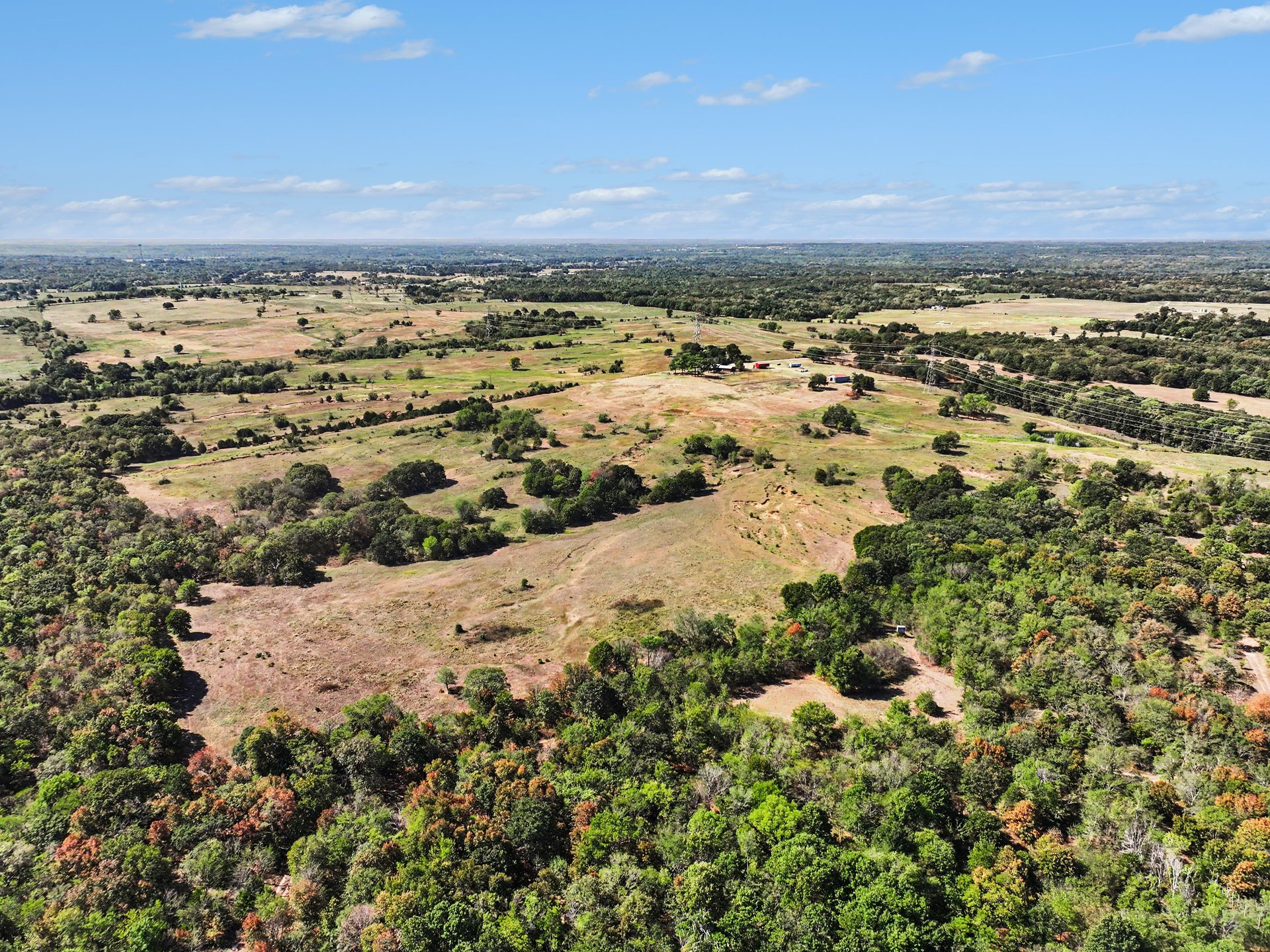 12526 3520th Road Seminole, OK 74868 - Photo 41 of 42 Expansive acreage featuring mature trees and open fields