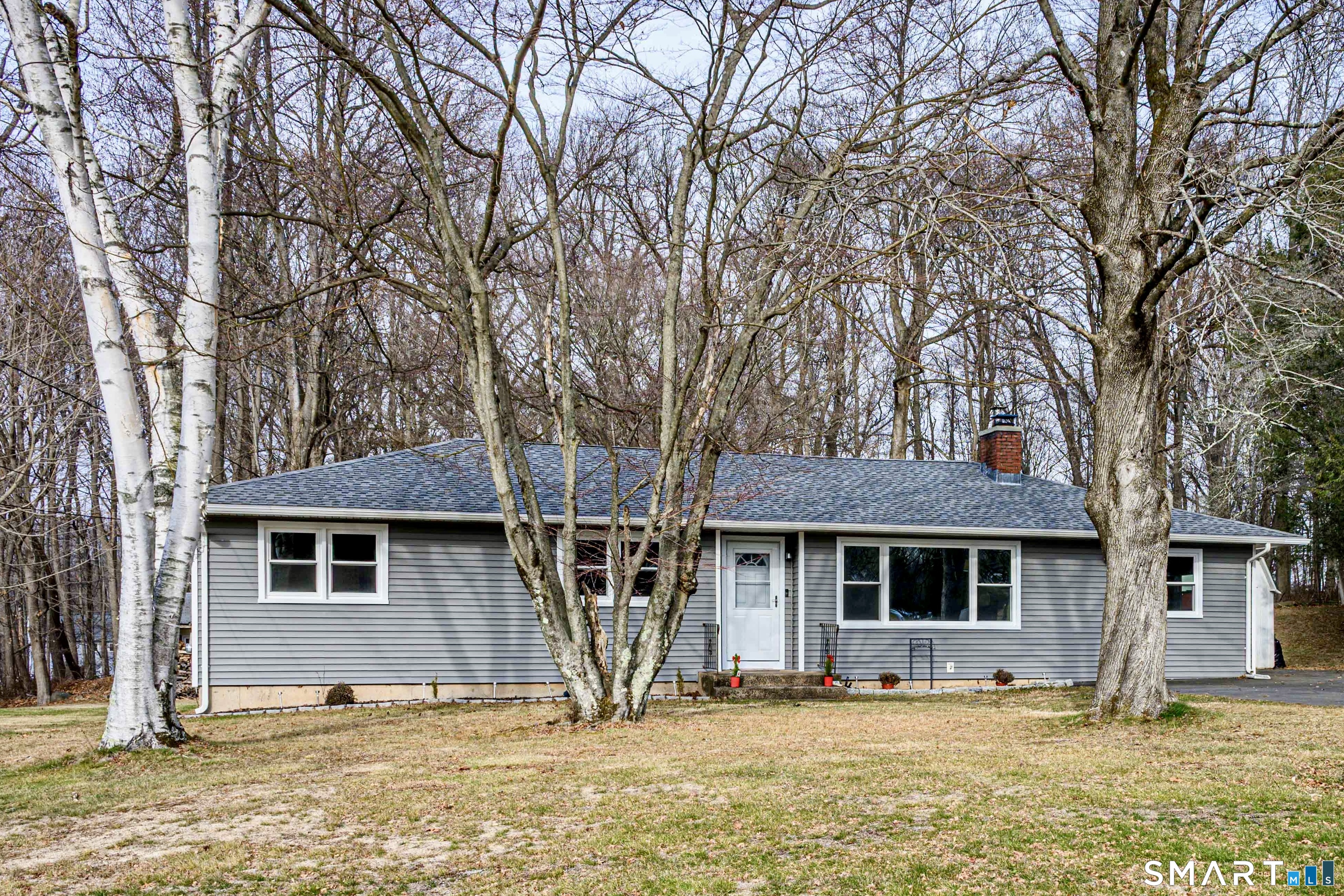 60 Nicholas Road Wallingford, CT 06492 - Photo 1 of 1 a front view of a house with a yard