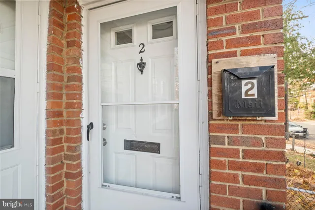 a bathroom with a shower and a mirror