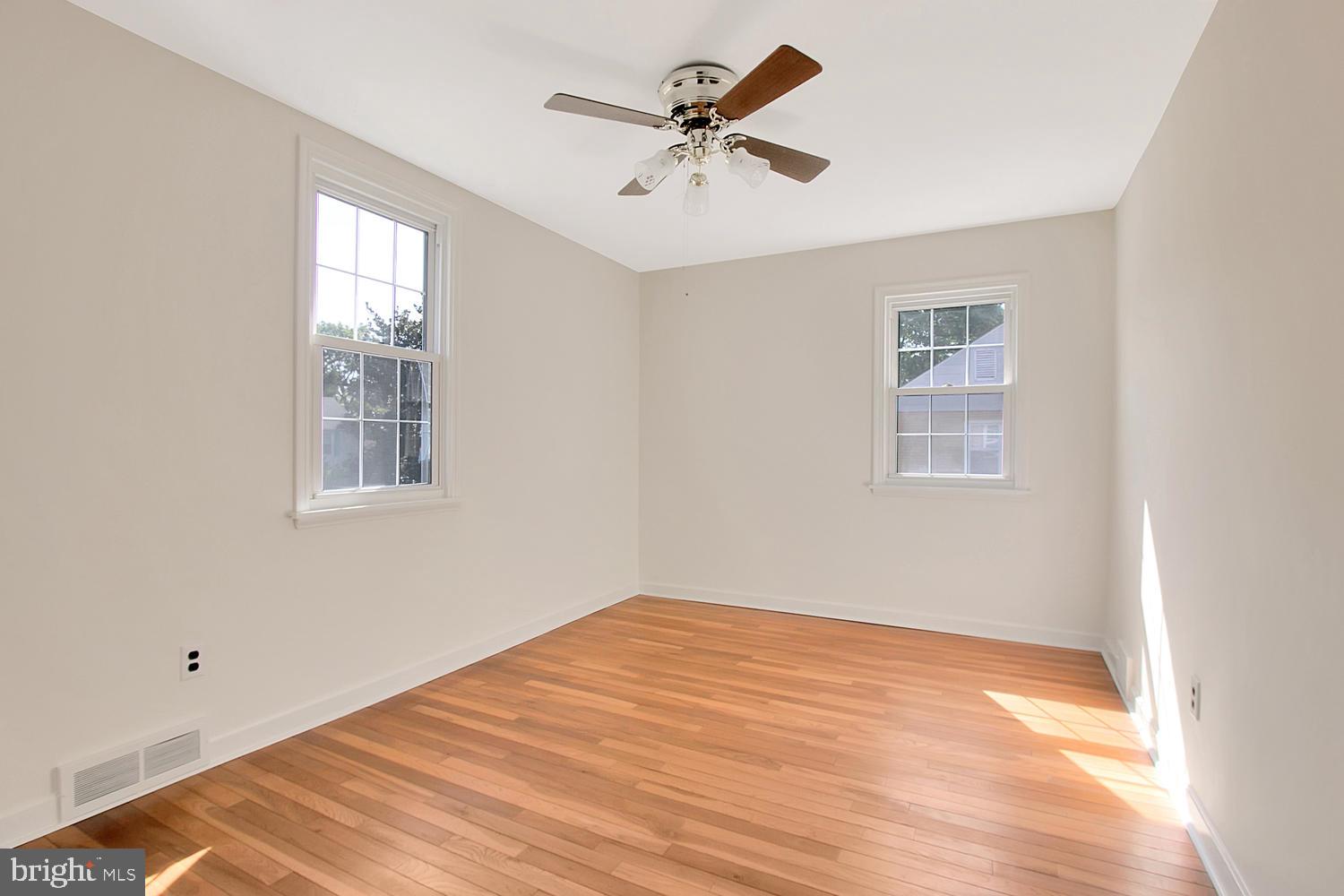 2206 Thomas Road Wilmington, DE 19803 - Photo 14 of 23 2nd bedroom with ceiling fan and hardwood flooring