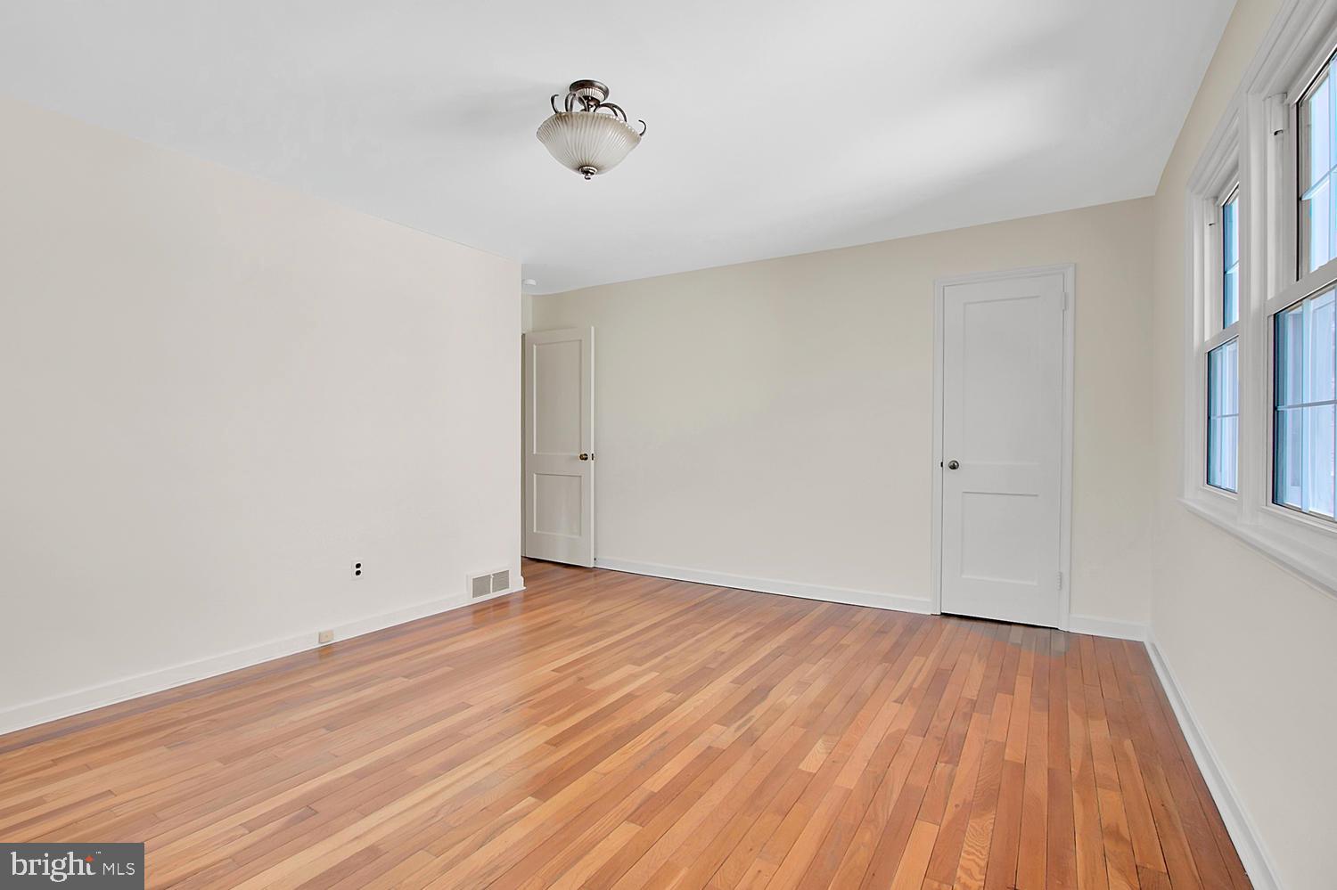2206 Thomas Road Wilmington, DE 19803 - Photo 15 of 23 3rd bedroom updated light fixture/hardwood floors