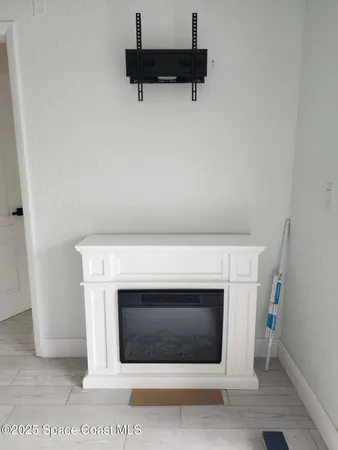 a utility room with a fireplace