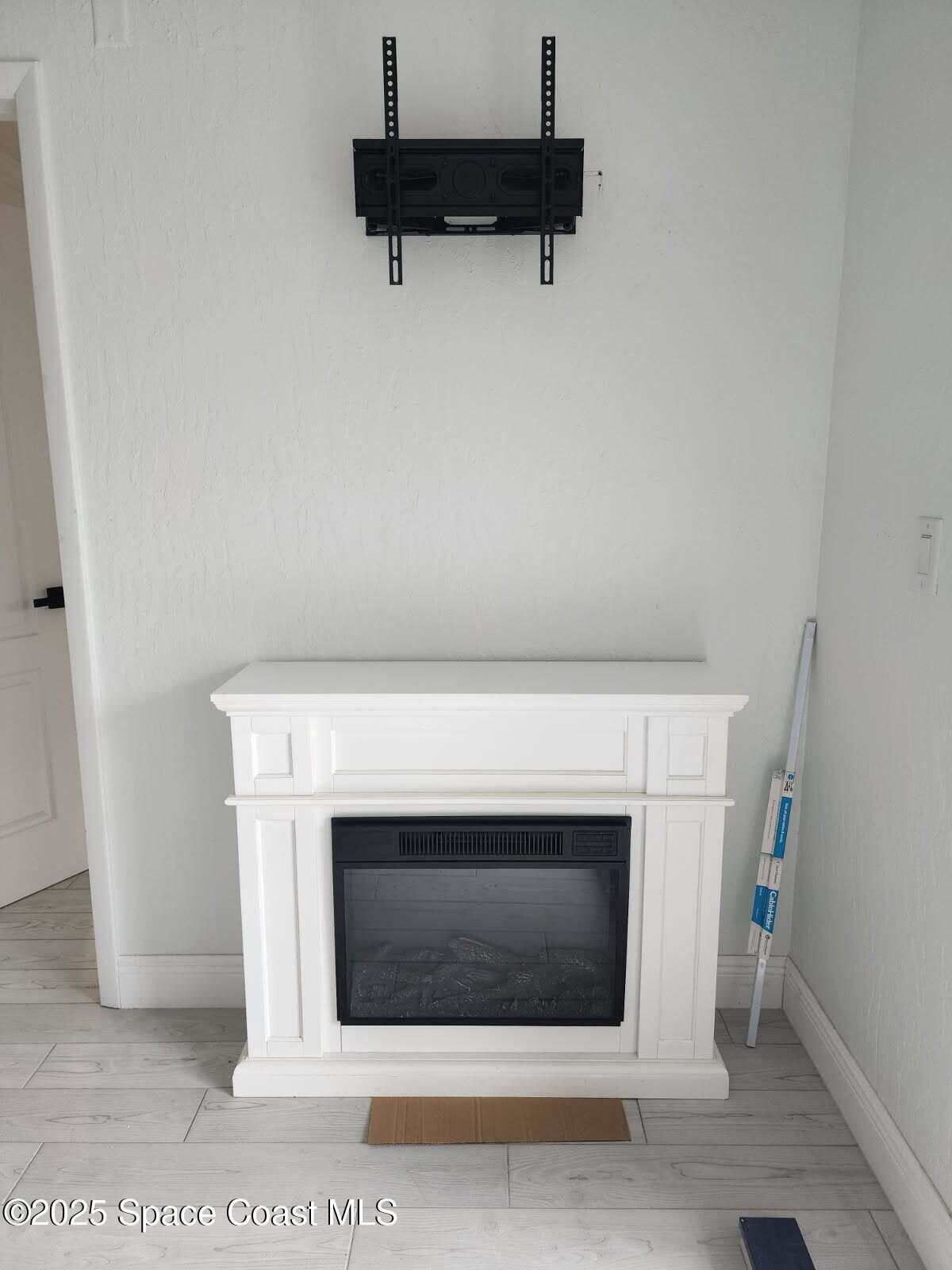 1704 University Lane, Unit 703 Cocoa, FL 32922 - Photo 18 of 18 a utility room with a fireplace