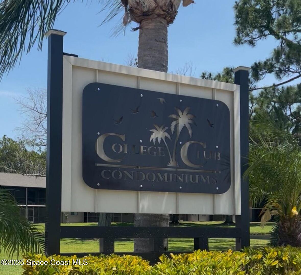 1704 University Lane, Unit 703 Cocoa, FL 32922 - Photo 2 of 18 a sign that is on the side of a building