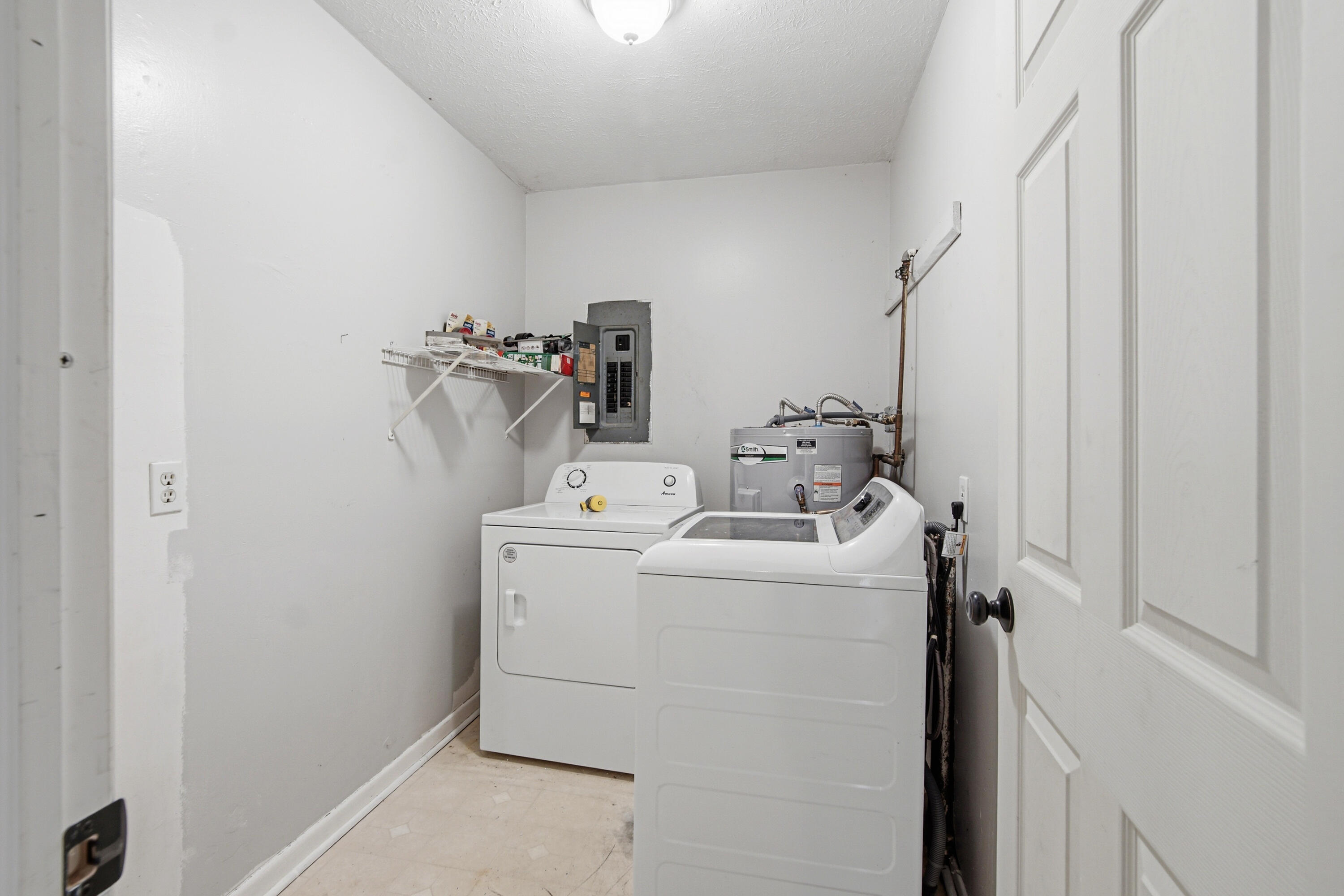1247 Amherst Road Panama City, FL 32405 - Photo 13 of 28 a utility room with dryer and washer