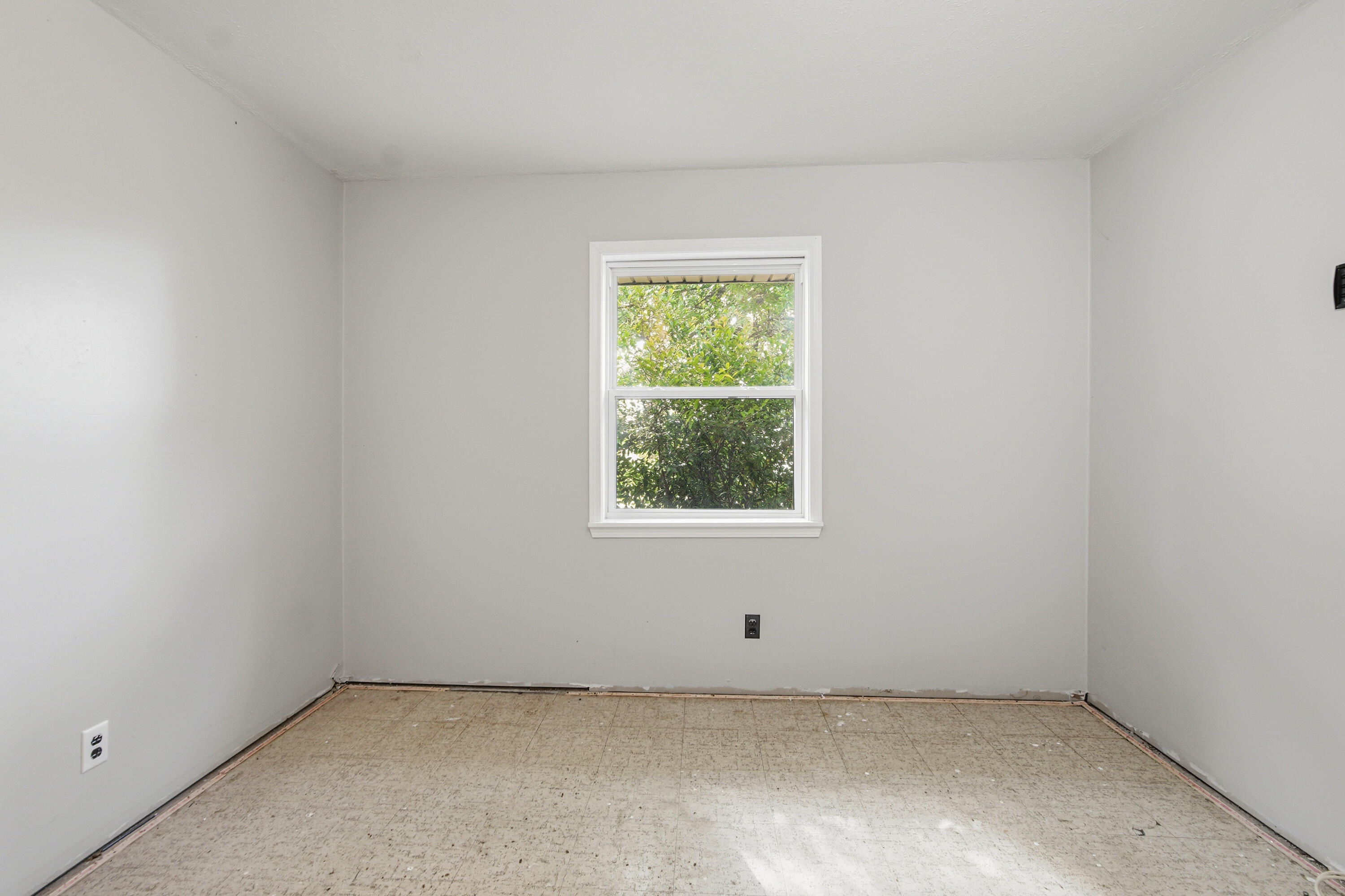 1247 Amherst Road Panama City, FL 32405 - Photo 23 of 28 an empty room with a window