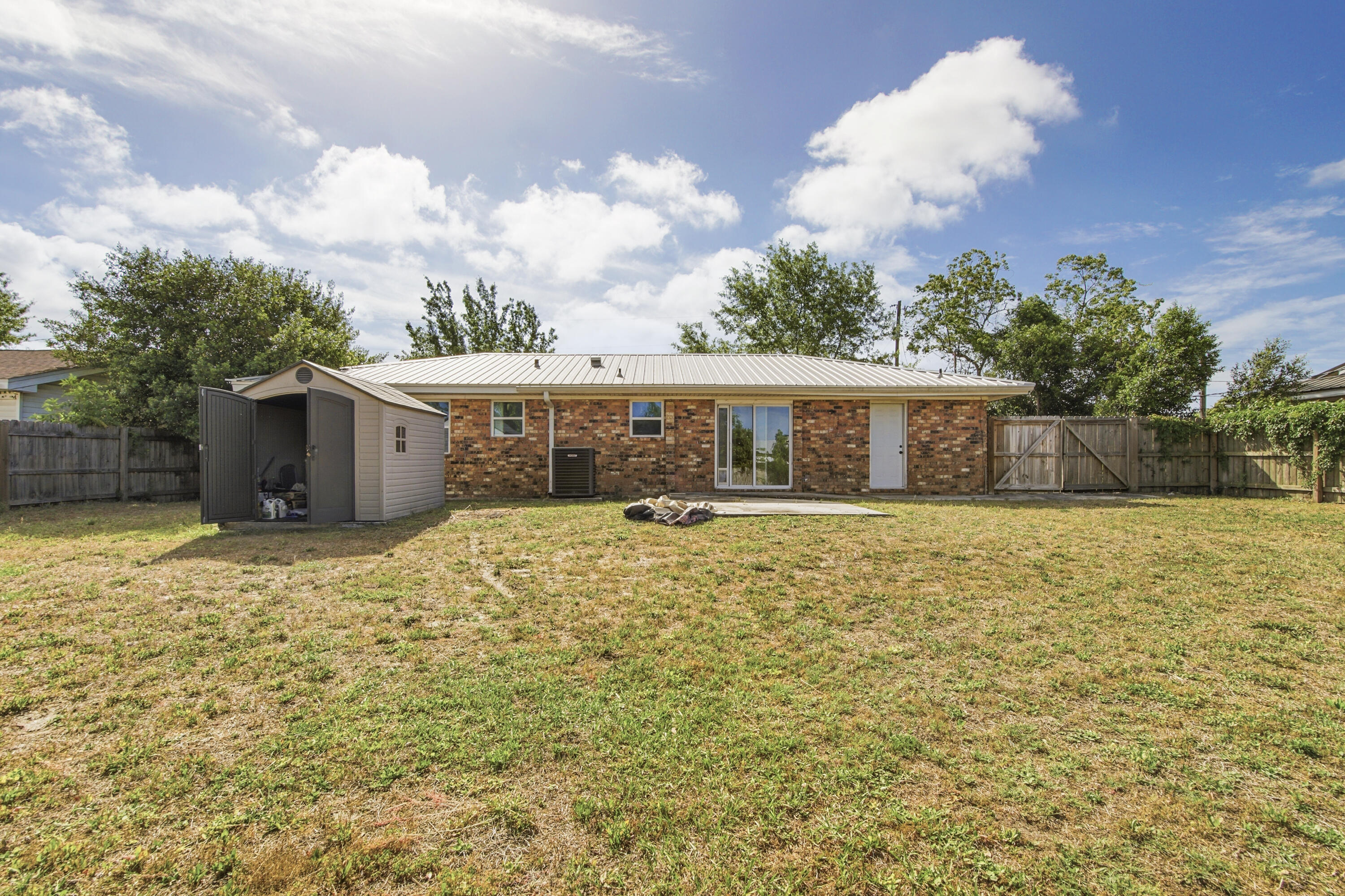 1247 Amherst Road Panama City, FL 32405 - Photo 26 of 28 a front view of house with yard