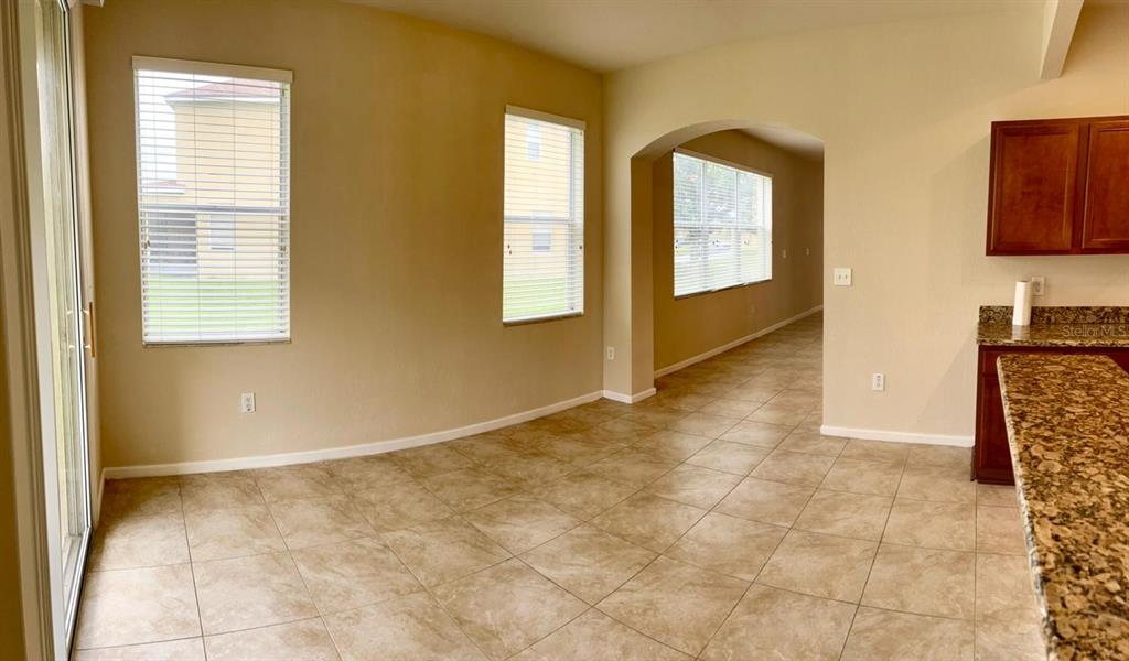 2992 Langdon Lane South Kissimmee, FL 34741 - Photo 16 of 39 a view of an empty room with window and bathroom