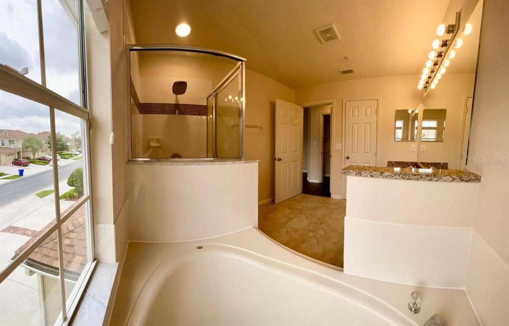 2992 Langdon Lane South Kissimmee, FL 34741 - Photo 21 of 39 a view of hallway with a large window