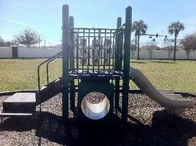 a view of a balcony with chairs