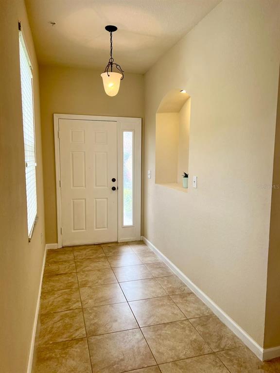 2992 Langdon Lane South Kissimmee, FL 34741 - Photo 10 of 39 a view of a hallway with entryway