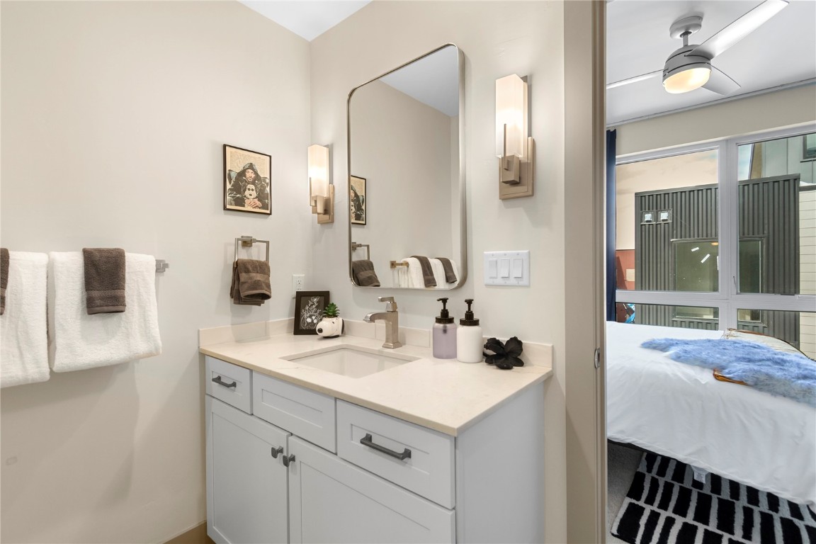 58 3rd Street, Unit D Silverthorne, CO 80498 - Photo 19 of 29 a bathroom with a sink and a mirror