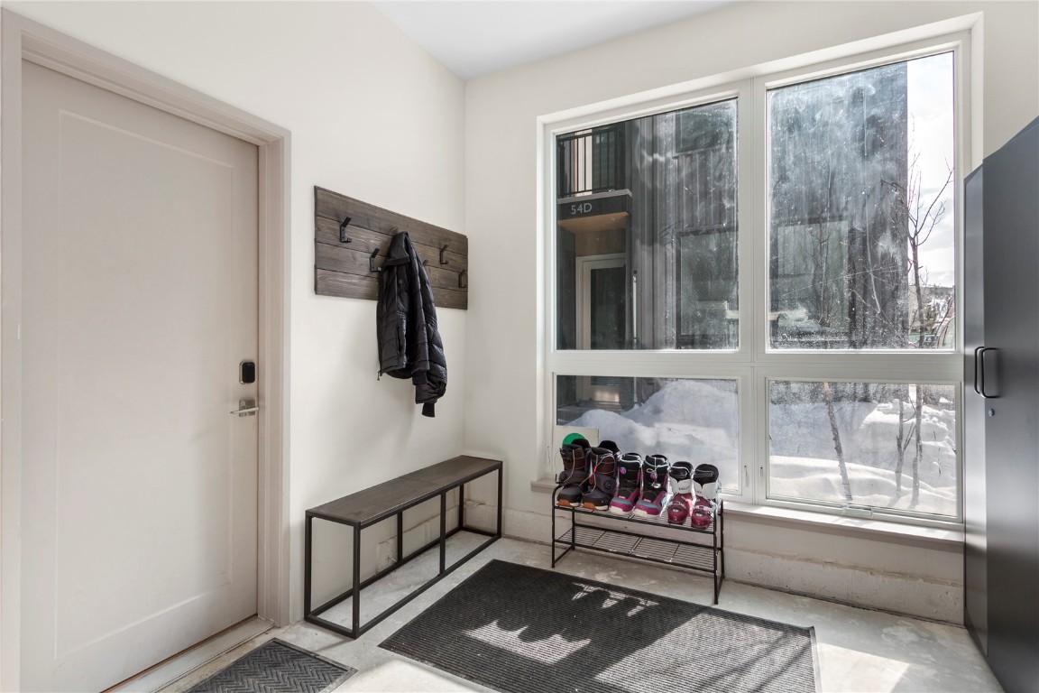 58 3rd Street, Unit D Silverthorne, CO 80498 - Photo 29 of 29 a view of livingroom with furniture and windows