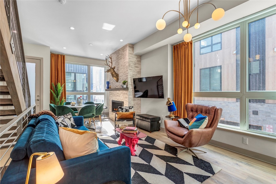 58 3rd Street, Unit D Silverthorne, CO 80498 - Photo 7 of 29 a living room with furniture and a flat screen tv