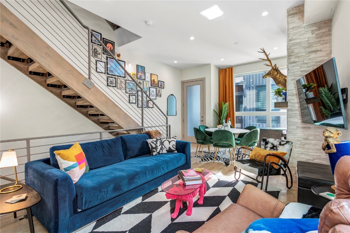58 3rd Street, Unit D Silverthorne, CO 80498 - Photo 8 of 29 a living room with furniture and a flat screen tv