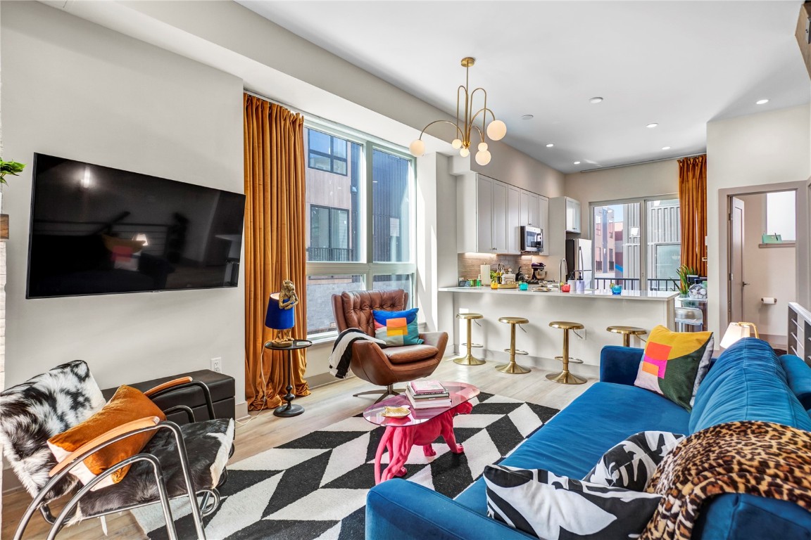 58 3rd Street, Unit D Silverthorne, CO 80498 - Photo 9 of 29 a living room with furniture and a flat screen tv