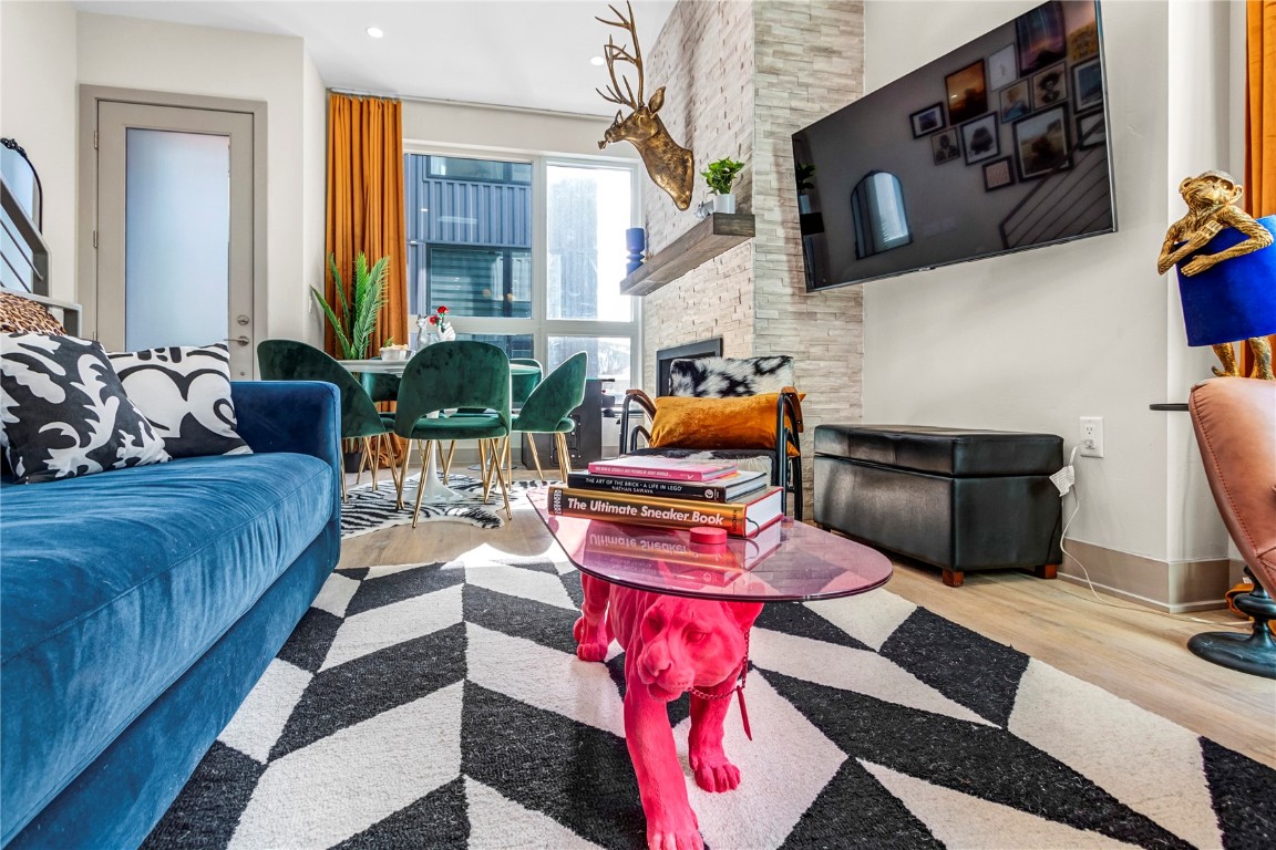 58 3rd Street, Unit D Silverthorne, CO 80498 - Photo 10 of 29 a living room with furniture and a fireplace