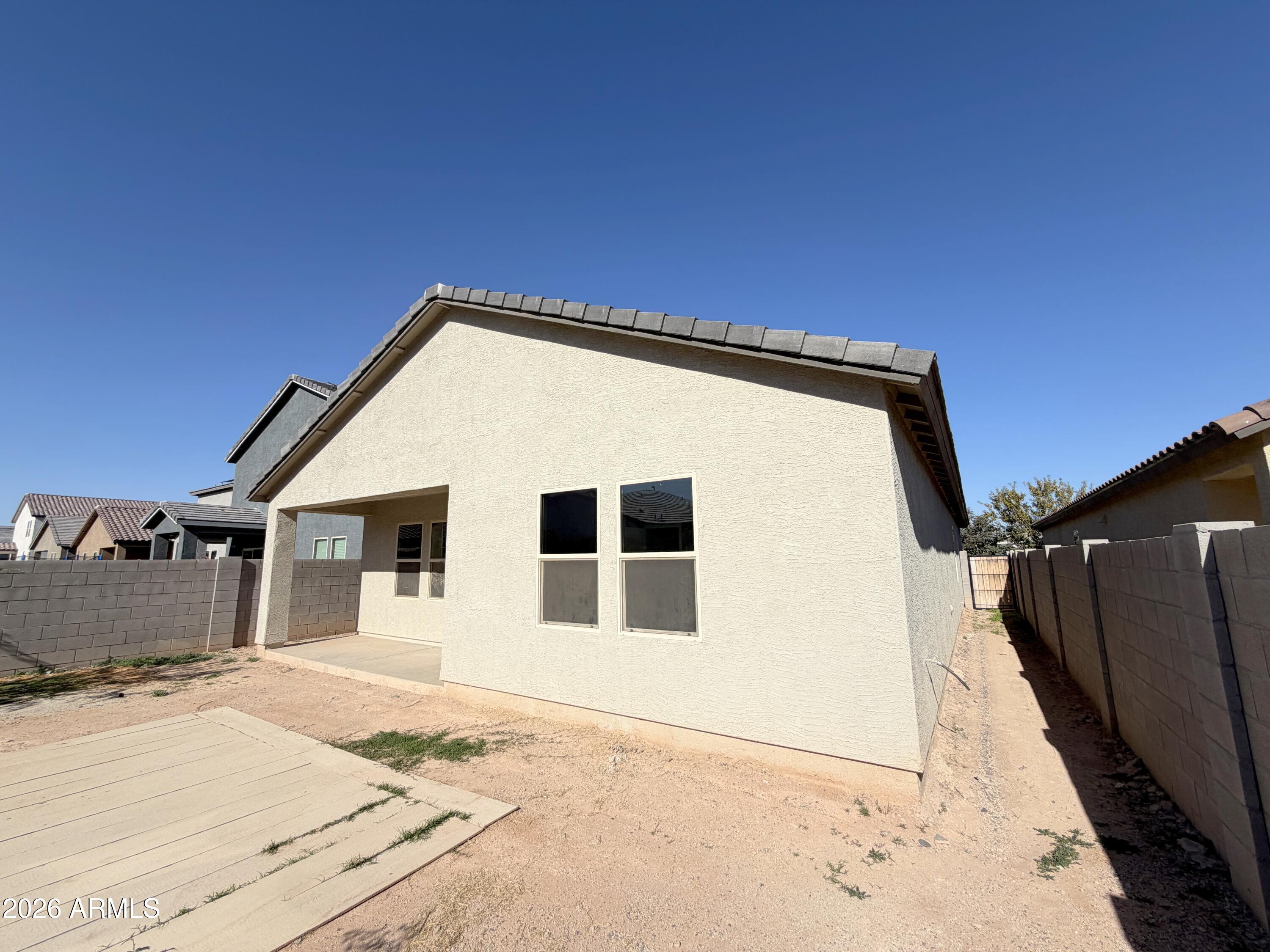 6085 East Athena Road Florence, AZ 85132 - Photo 20 of 21 a back yard of the house