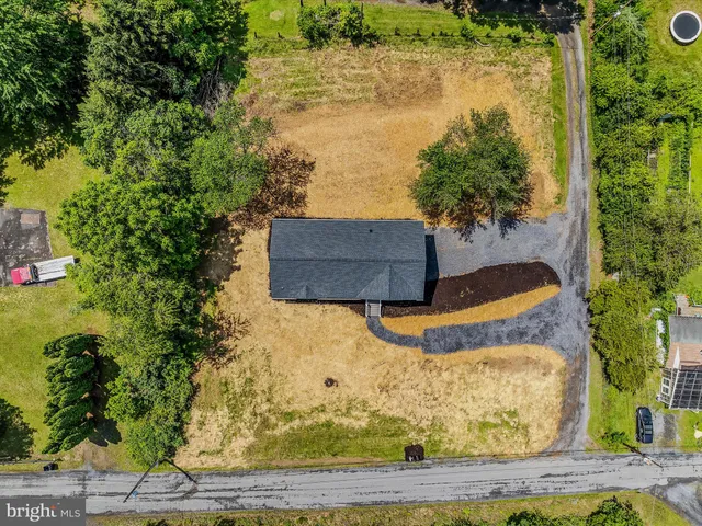 a view of a yard with an outdoor space and seating area