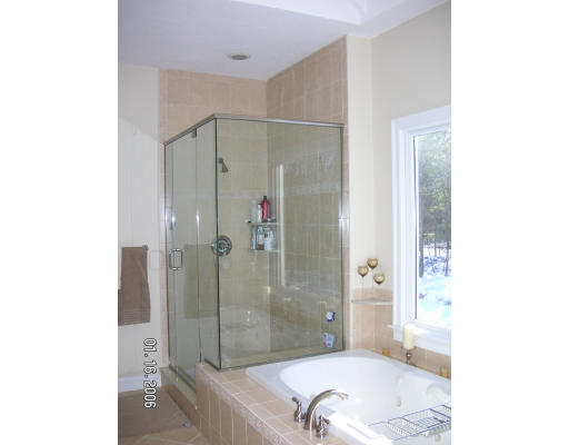 68 Peach Hill Road Berlin, MA 01503 - Photo 12 of 14 a bathroom with a bathtub and a shower