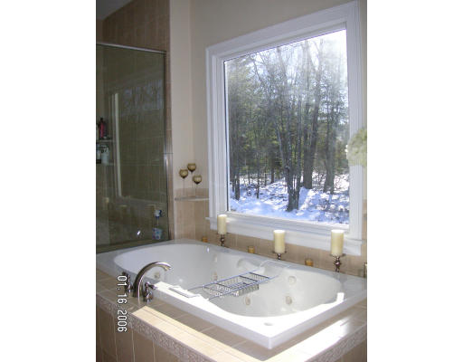 68 Peach Hill Road Berlin, MA 01503 - Photo 13 of 14 a bathroom with a tub and sink