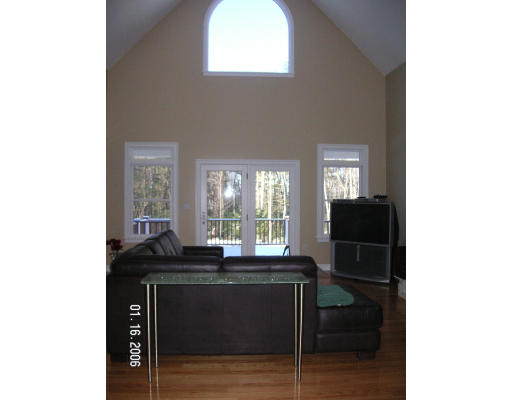 68 Peach Hill Road Berlin, MA 01503 - Photo 9 of 14 a kitchen with a sink cabinets and a window