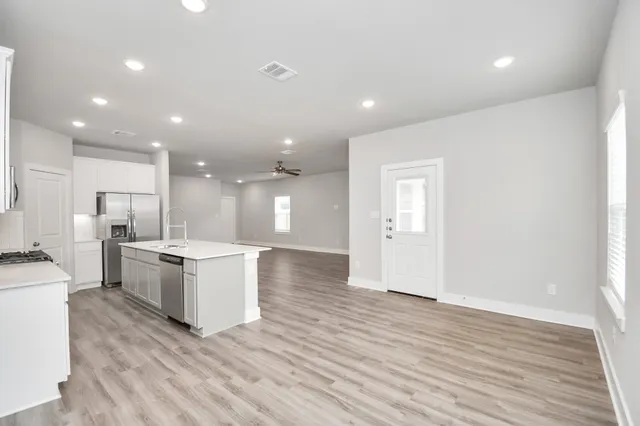 a large kitchen with a lot of counter space