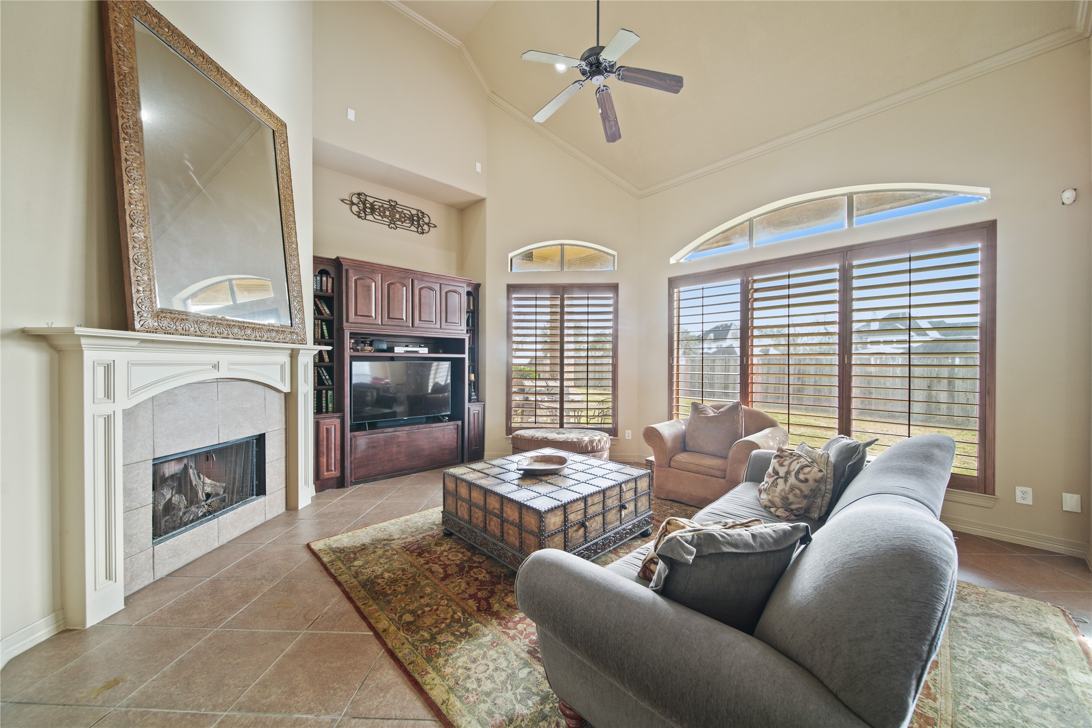 3414 Rue Orleans Missouri City, TX 77459 - Photo 15 of 46 a living room with furniture fireplace and flat screen tv