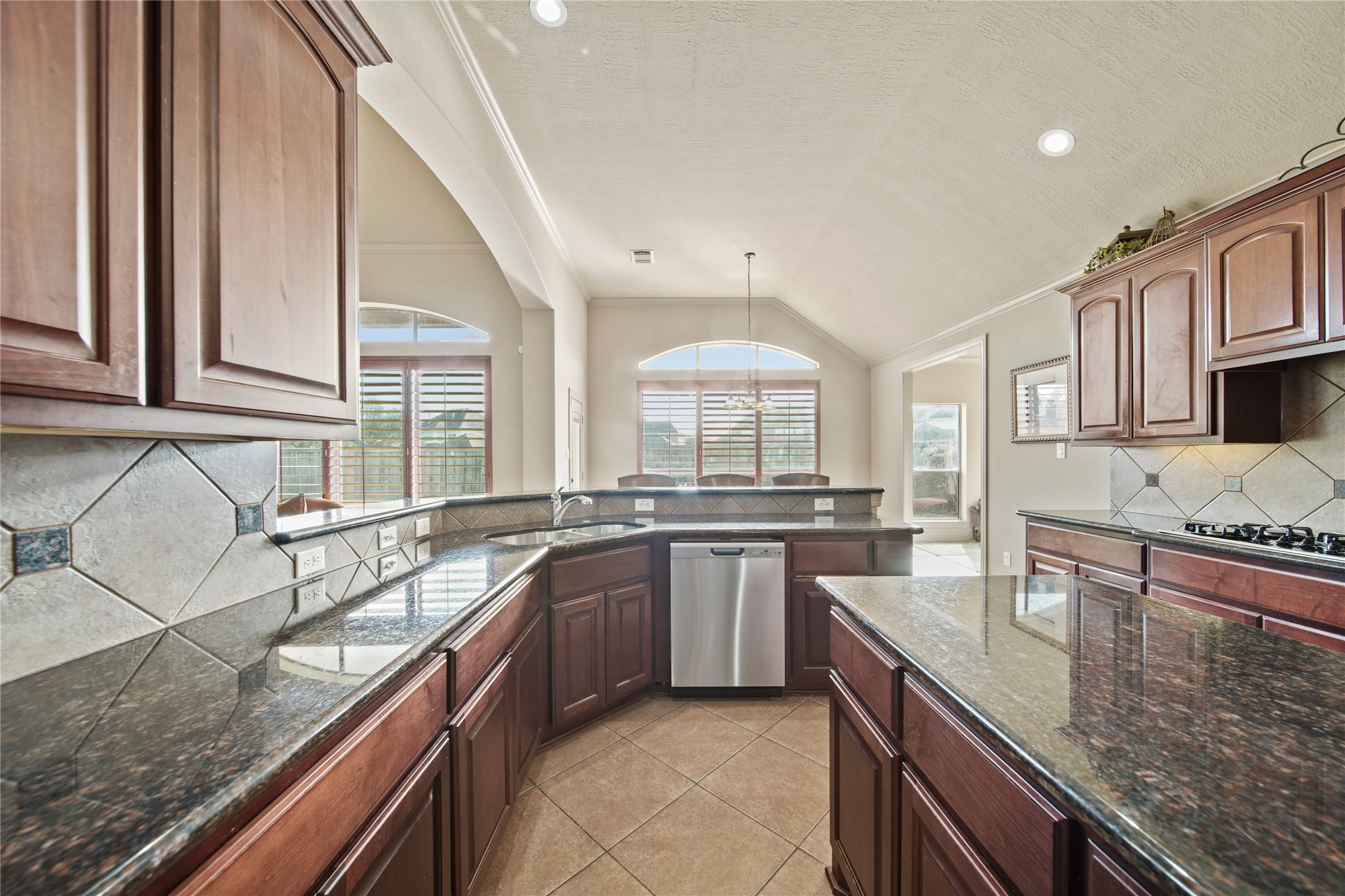 3414 Rue Orleans Missouri City, TX 77459 - Photo 20 of 46 a kitchen with lots of counter space and a sink